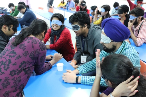 A group picture of Hackathon 2019 with students and teams coding and trying to understand accessibility